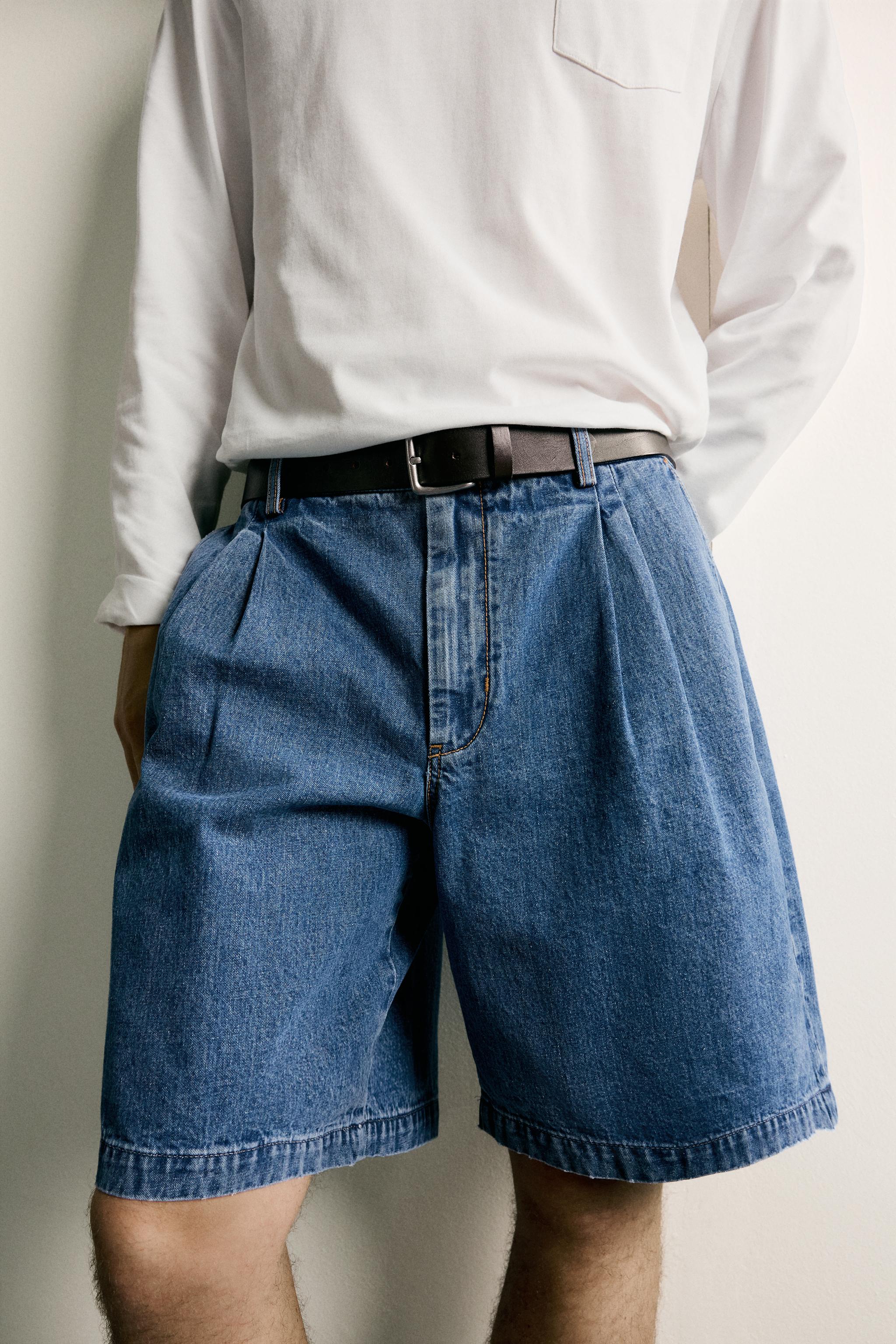 REGULAR FIT PLEATED DENIM SHORTS